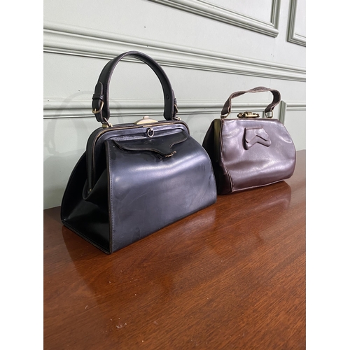 1090 - Two vintage French leather handbags {Approx. 32 cm H x 27 cm W x 10 cm D}.