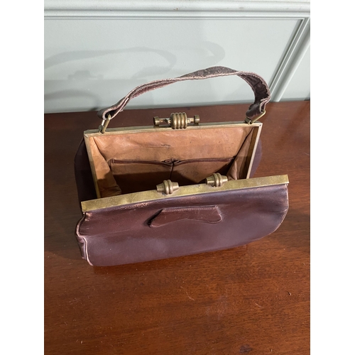 1090 - Two vintage French leather handbags {Approx. 32 cm H x 27 cm W x 10 cm D}.