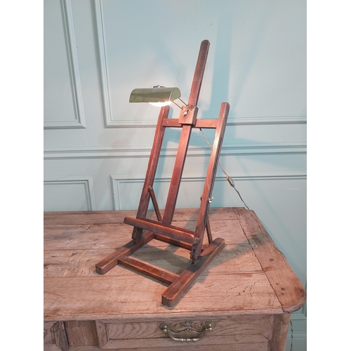 1102 - 1950s oak easel with light {78 cm H x 30 cm W x 37 cm D}.