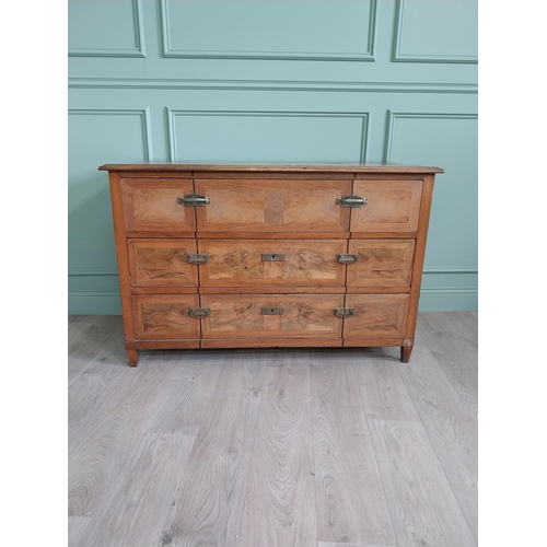 1104 - 19th C. French walnut chest of drawers with three long drawers and brass handles raised on square ta... 