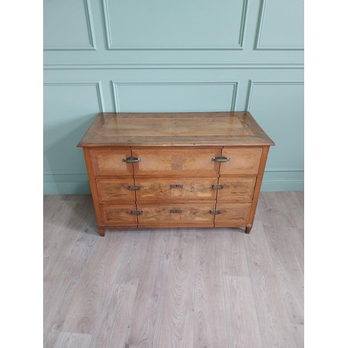 1104 - 19th C. French walnut chest of drawers with three long drawers and brass handles raised on square ta... 