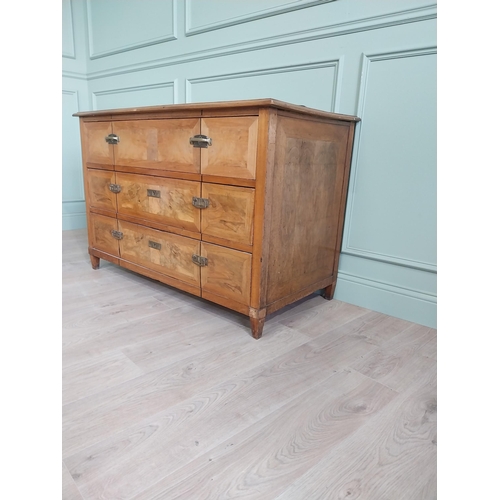 1104 - 19th C. French walnut chest of drawers with three long drawers and brass handles raised on square ta... 