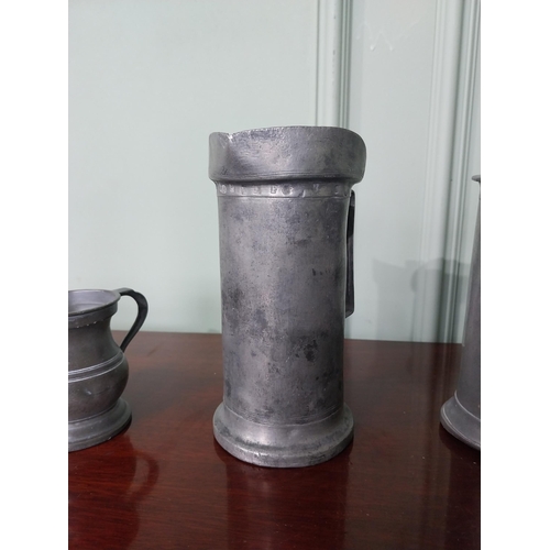 1108 - Collection five 19th C. pewter measures {Largest 17 cm H x 13 cm W x 9 cm D AND 8 cm H x 9 cm W x 6 ... 