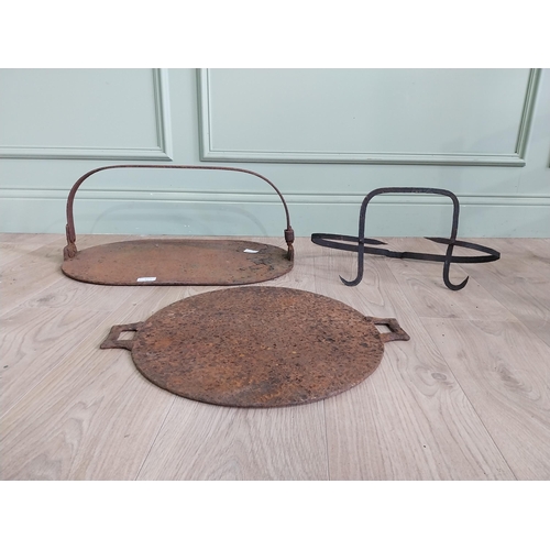 1111 - Three 19th C. cast iron griddles {22 cm H x 52 cm W x 34 cm D, 25 cm H x 44 cm W x 23 cm D and 41 cm... 