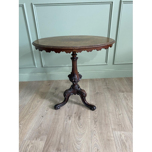 1114 - 19th C. walnut and satinwood inlaid wine table raised on carved column and three out swept feet {72 ... 