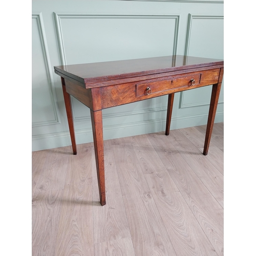 1118 - Georgian mahogany turn over leaf tea table with single drawer in the frieze raised on square tapered... 