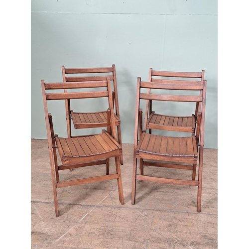 1134 - Set of four teak folding chairs  {H 78cm x W 46cm x D 41cm }. - NOT AVAILABLE TO VIEW IN PERSON