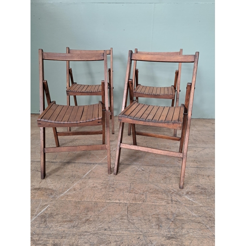 1134 - Set of four teak folding chairs  {H 78cm x W 46cm x D 41cm }. - NOT AVAILABLE TO VIEW IN PERSON