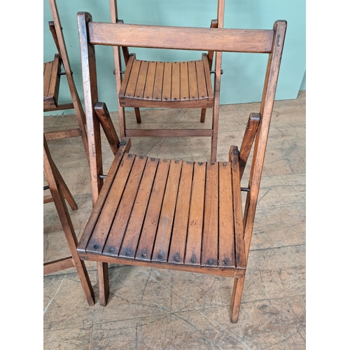 1134 - Set of four teak folding chairs  {H 78cm x W 46cm x D 41cm }. - NOT AVAILABLE TO VIEW IN PERSON