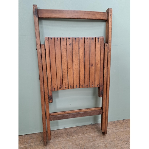 1134 - Set of four teak folding chairs  {H 78cm x W 46cm x D 41cm }. - NOT AVAILABLE TO VIEW IN PERSON