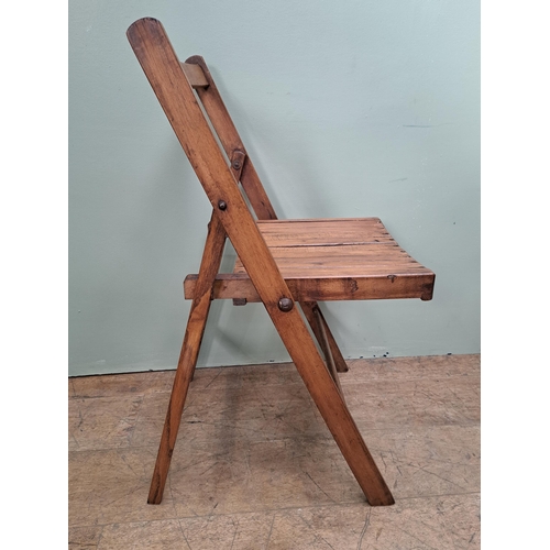 1134 - Set of four teak folding chairs  {H 78cm x W 46cm x D 41cm }. - NOT AVAILABLE TO VIEW IN PERSON