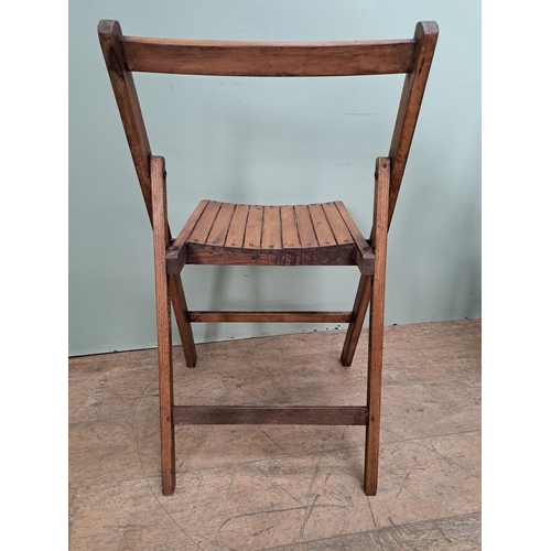 1134 - Set of four teak folding chairs  {H 78cm x W 46cm x D 41cm }. - NOT AVAILABLE TO VIEW IN PERSON