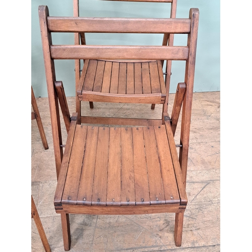 1134 - Set of four teak folding chairs  {H 78cm x W 46cm x D 41cm }. - NOT AVAILABLE TO VIEW IN PERSON