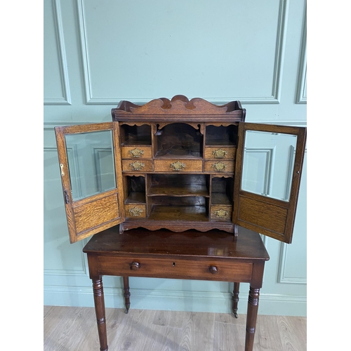 1136 - Good quality Edwardian oak smokers cabinet with two glazed doors and fitted interior {62 cm H x 54 c... 