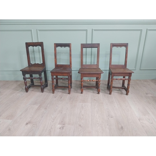 1138 - Harlequin set of four 19th C. French oak chairs {83 cm H x 42 cm W x 36 cm D}.