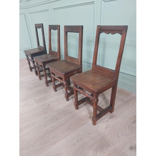 1138 - Harlequin set of four 19th C. French oak chairs {83 cm H x 42 cm W x 36 cm D}.