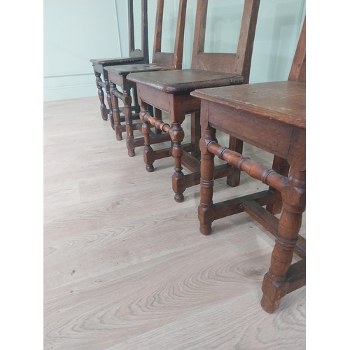 1138 - Harlequin set of four 19th C. French oak chairs {83 cm H x 42 cm W x 36 cm D}.