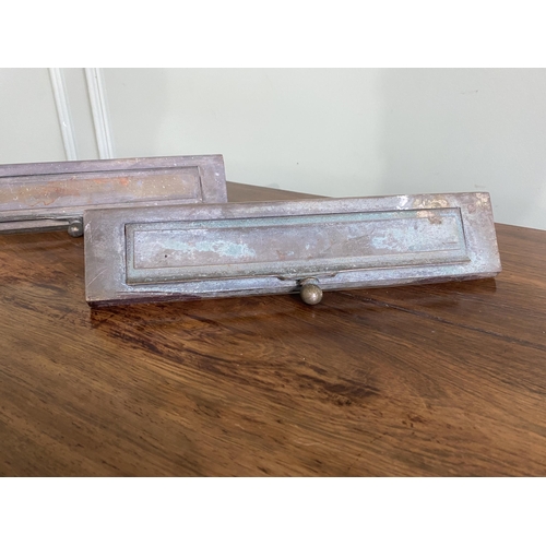 1143 - Pair of early 20th C. brass door letter boxes {9 cm H x 34 cm W x 7 cm D}.