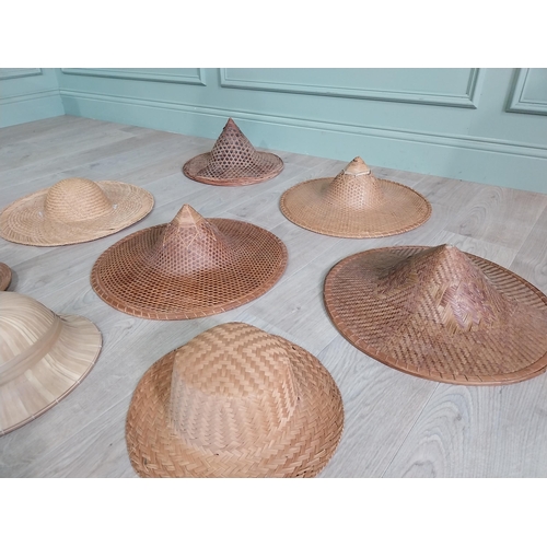 1149 - Collection of nine 20th C. wicker hats.