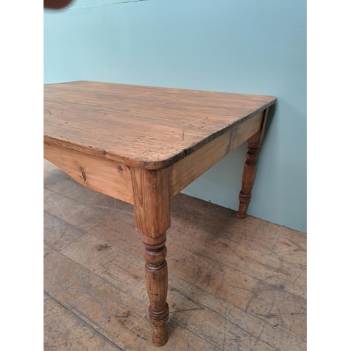 1153 - Fruitwood kitchen table with single drawer in the frieze raised on turned legs  {H 74cm x W 152cm x ... 