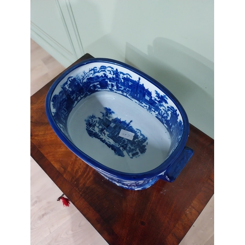 116 - Decorative blue and white ceramic foot bath {14 cm H x 35 cm W x 23 cm D}.