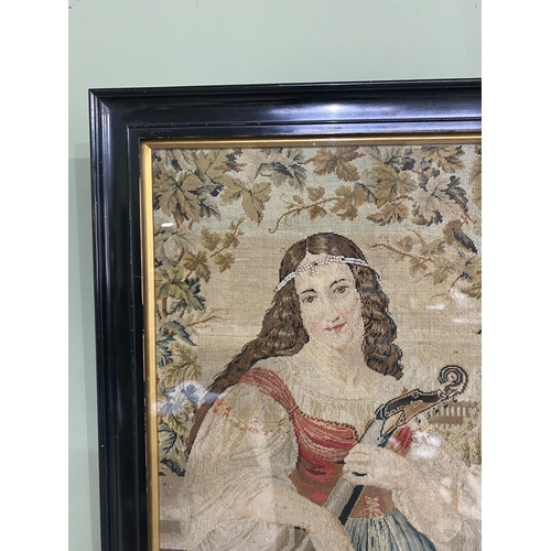 117 - 19th C. maiden tapestry mounted in ebonised frame {47 cm H x 39 cm W}.