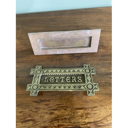 1180 - Two early 20th C. brass door letter boxes {8 cm H x 20 cm W x 6 cm D and 9 cm W x 19 cm W}.