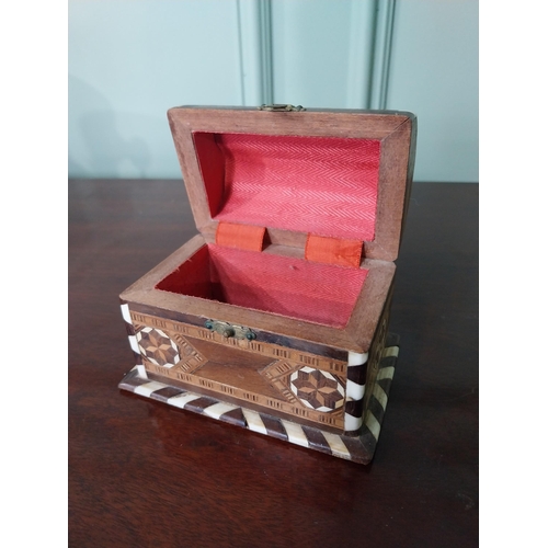 1194 - Early 20th C. specimen wood and bone inlaid dome top jewellery box {8 cm H x 11 cm W x 8 cm D}.