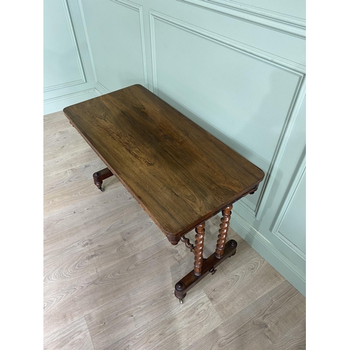 1205 - 19th C. rosewood side table raised on barley twist columns, single stretcher and platform feet {69 c... 