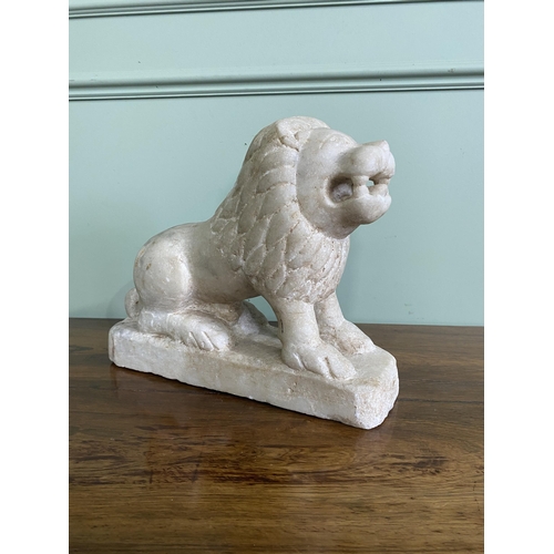 1206 - Carved Oriental marble statuette of a Lion {29 cm H x 35 cm W x 12 cm D}.