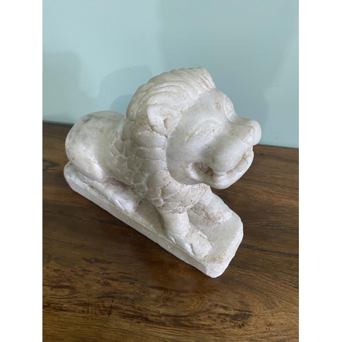 1206 - Carved Oriental marble statuette of a Lion {29 cm H x 35 cm W x 12 cm D}.