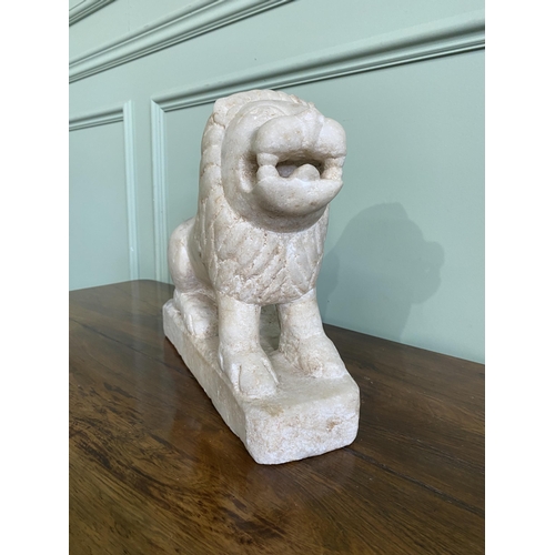 1206 - Carved Oriental marble statuette of a Lion {29 cm H x 35 cm W x 12 cm D}.