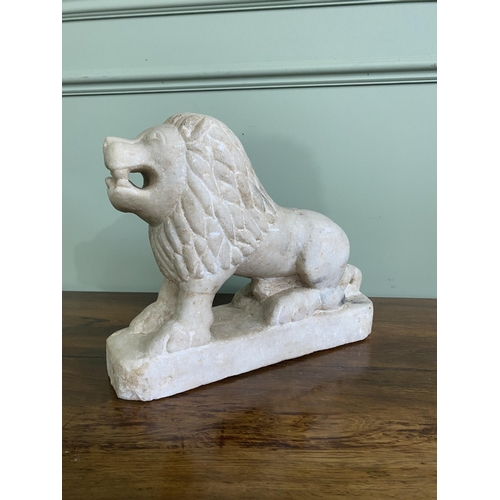 1206 - Carved Oriental marble statuette of a Lion {29 cm H x 35 cm W x 12 cm D}.