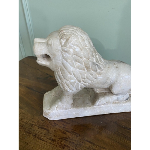 1206 - Carved Oriental marble statuette of a Lion {29 cm H x 35 cm W x 12 cm D}.