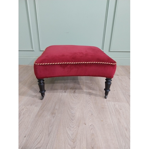 1213 - 19th C. French upholstered footstool raised on ebonised turned legs and brass castors {37 cm H x 68 ... 