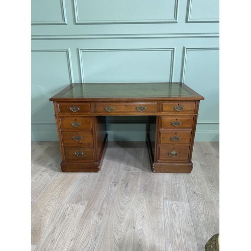 1217 - Edwardian oak pedestal desk with inset leather top {72 cm H x 123 cm W x 66 cm D}.