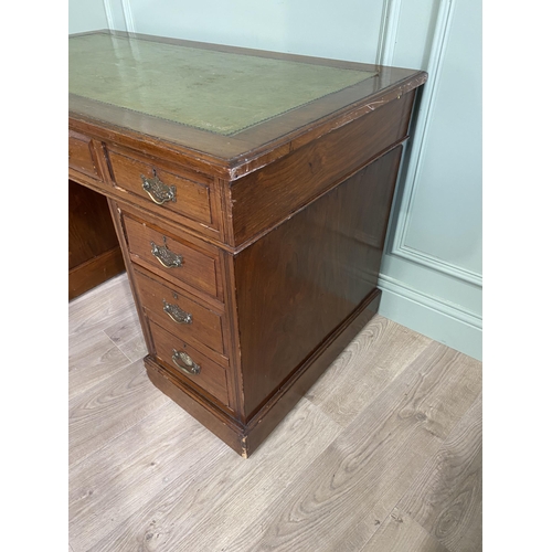 1217 - Edwardian oak pedestal desk with inset leather top {72 cm H x 123 cm W x 66 cm D}.