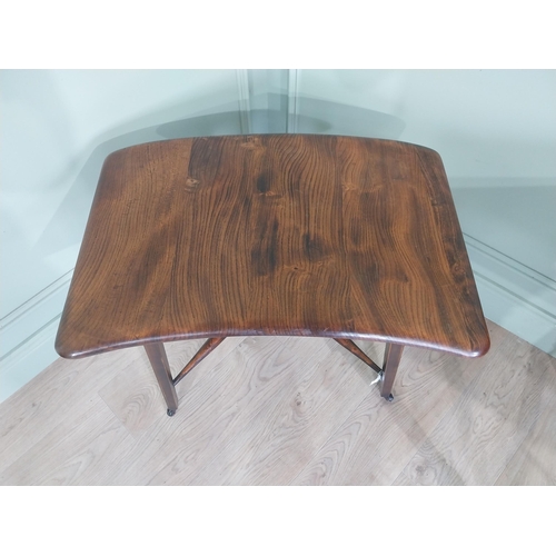 1225 - Mid-century oak Ercol lamp table {60 cm H x 69 cm W x 48 cm D}.