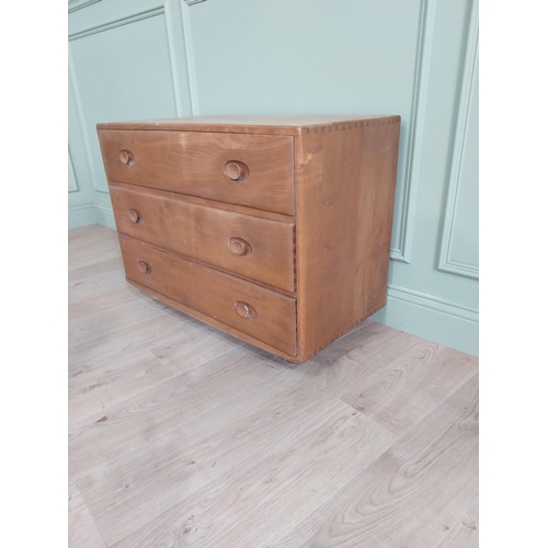 1226 - Oak Ercol chest of drawers with three drawers {66 x 92 x 44 cm D}.