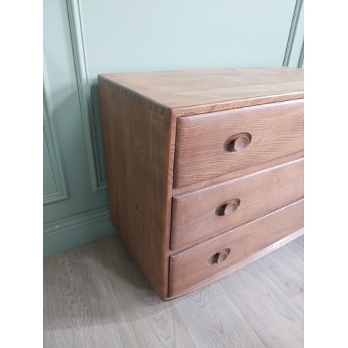 1226 - Oak Ercol chest of drawers with three drawers {66 x 92 x 44 cm D}.