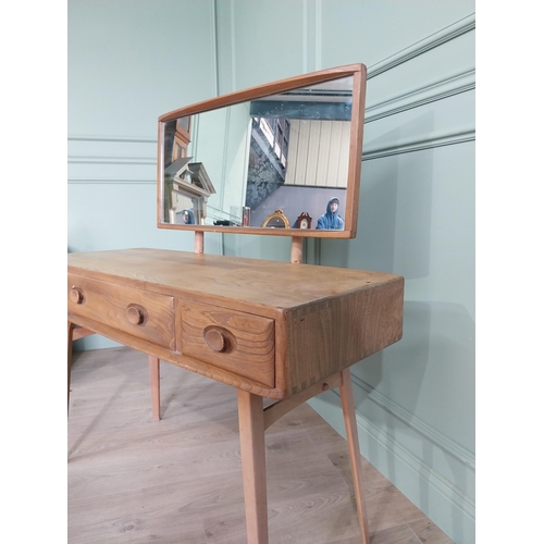 1227 - Oak Ercol dressing table with three drawers in the frieze raised on square tapered legs {124 x 115 x... 