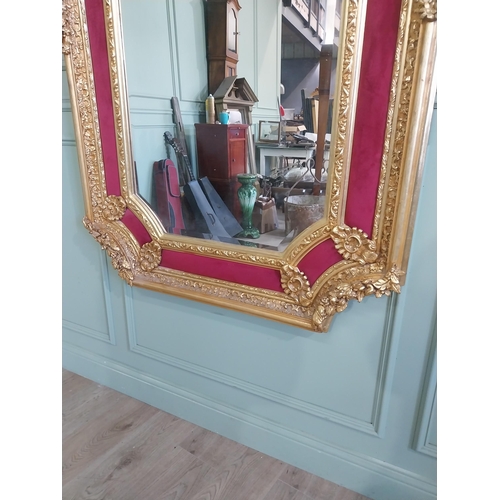 1257 - Decorative French gilt wall mirror in the Victorian style {200 cm H x 110 cm W}.