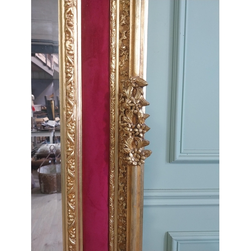 1257 - Decorative French gilt wall mirror in the Victorian style {200 cm H x 110 cm W}.