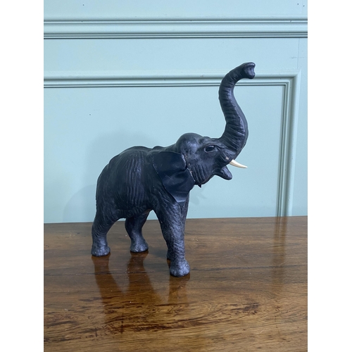 1264 - Early 20th C. French leather statuette of an Elephant {36 cm H x 32 cm W x 12 cm D}.