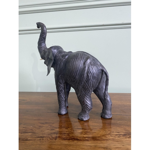 1264 - Early 20th C. French leather statuette of an Elephant {36 cm H x 32 cm W x 12 cm D}.