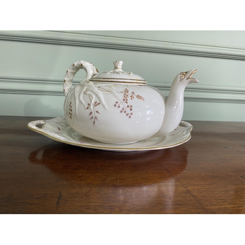 1268 - Belleek plate and teapot {3 cm H x 29 cm W x 25 cm D and 13 cm H x 23 cm W x 18 cm D}.