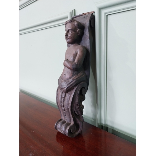 1269 - 18th C. carved oak corbel depicting Boy {37 cm H x 9 cm W x 7 cm D}.