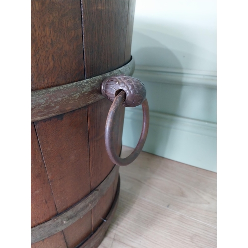 127 - Good quality Edwardian metal bound oak log bucket with wrought iron handles {43 cm H x 54 cm Dia.}.