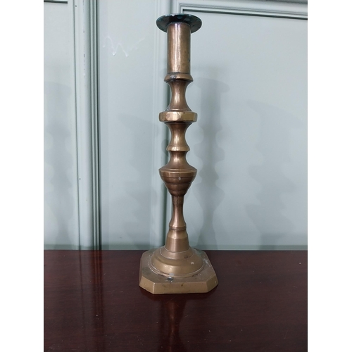 1282 - Pair of brass candlesticks {13 cm H x 9 cm Dia.}.