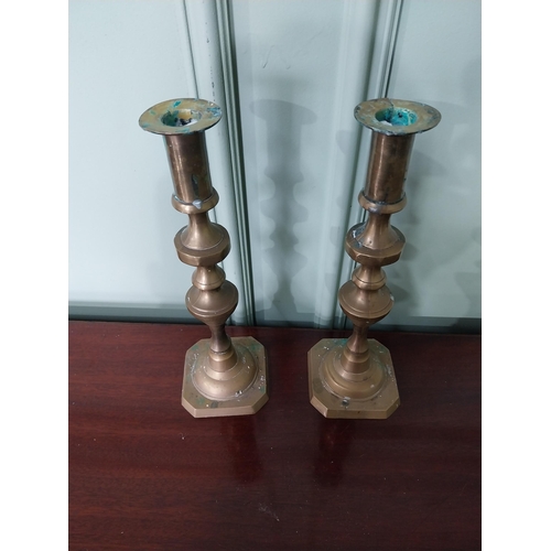 1282 - Pair of brass candlesticks {13 cm H x 9 cm Dia.}.